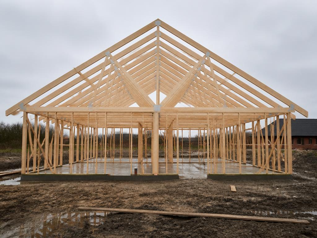 Timber frame house shell (raw house) built through the WoodStocks system