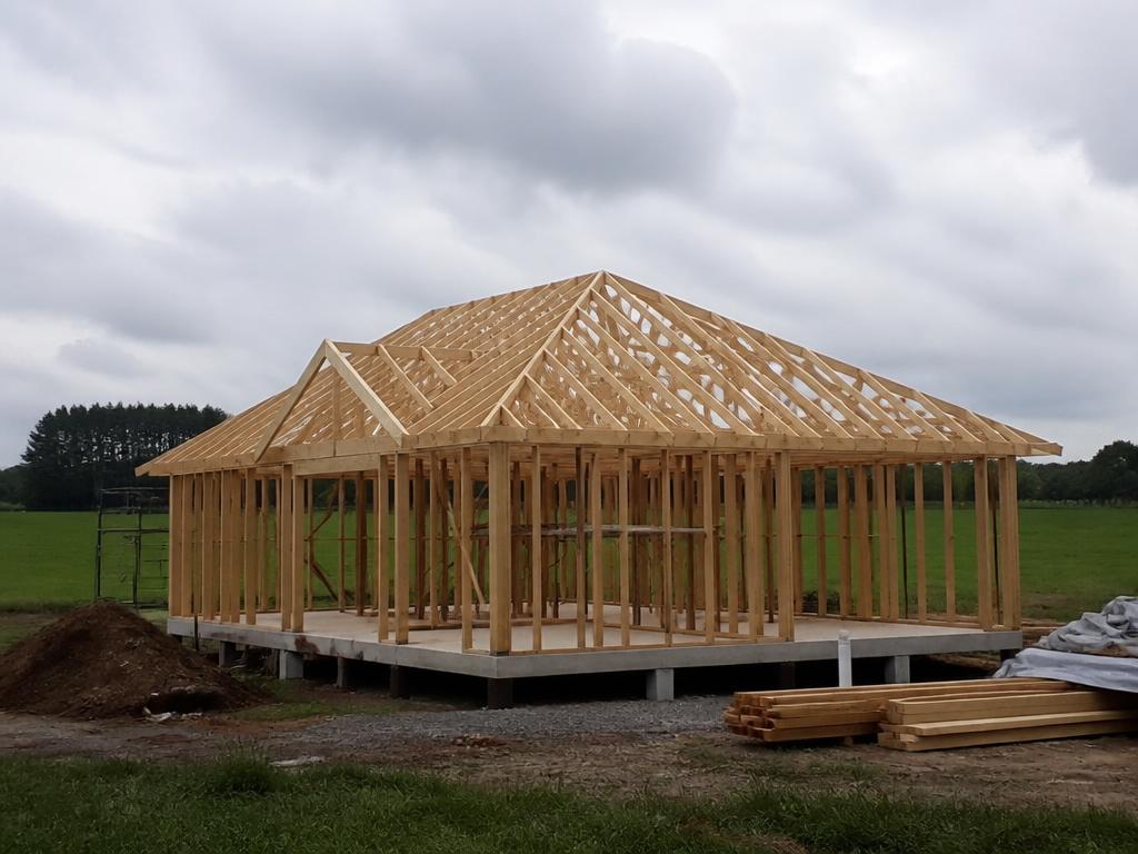 Timber frame house shell (raw house) built through the WoodStocks system